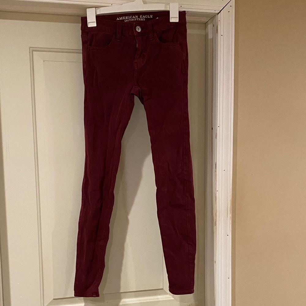 American Eagle Outfitters Burgundy Super Stretch Jeans size 0 good condition